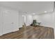 Bedroom with hardwood floors, a desk and office chair, and two closets at 510 Watergate Ct, Roswell, GA 30076