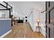 Bright and open living area featuring hardwood floors, a fireplace, and large windows at 510 Watergate Ct, Roswell, GA 30076