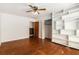 Bedroom with closet and open shelving and hardwood floors at 2386 Springrun Way, Decatur, GA 30032
