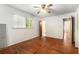 Spacious bedroom featuring hardwood floors, window and a closet at 2386 Springrun Way, Decatur, GA 30032