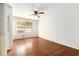 Bedroom with hardwood floors, ceiling fan, and window at 2386 Springrun Way, Decatur, GA 30032