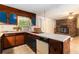 Kitchen view with wood cabinets, breakfast bar and vintage appliances at 2386 Springrun Way, Decatur, GA 30032