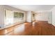 Spacious living area features hardwood floors, white walls, and ample natural light at 2386 Springrun Way, Decatur, GA 30032