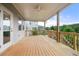 Spacious back deck is great for entertaining and features a ceiling fan for added comfort at 307 Cochin Dr, Woodstock, GA 30188