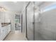 Bathroom with a large glass enclosed shower and a double vanity at 307 Cochin Dr, Woodstock, GA 30188