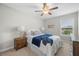 Bedroom featuring neutral paint and carpet, along with modern furnishings at 307 Cochin Dr, Woodstock, GA 30188