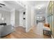 Hallway with wood-look floors and trim details at 307 Cochin Dr, Woodstock, GA 30188