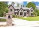 Stunning brick home with well-manicured lawn, brick mailbox and elegant driveway at 3338 Breton Ne Cir, Brookhaven, GA 30319