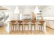 Open kitchen with a large center island, pendant lighting, and seating for five at 3338 Breton Ne Cir, Brookhaven, GA 30319
