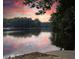 Picturesque lake view at sunset with beautiful colorful reflection at 3338 Breton Ne Cir, Brookhaven, GA 30319