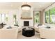 Bright and airy living room with fireplace and ample natural light at 3338 Breton Ne Cir, Brookhaven, GA 30319