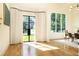 Bright living room with hardwood floors and large windows providing lots of natural light at 3338 Breton Ne Cir, Brookhaven, GA 30319