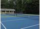 Close up view of community tennis court with an enclosed net at 3338 Breton Ne Cir, Brookhaven, GA 30319