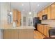 Spacious kitchen with granite countertops, stainless steel appliances, and a breakfast nook at 4915 Lazy Creek Ct, Cumming, GA 30028