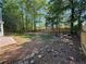 Large backyard featuring a new wooden fence at 1221 St James Pl, Loganville, GA 30052
