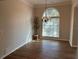 Bright dining room with ample natural light, chandelier, and plenty of space for entertaining at 1221 St James Pl, Loganville, GA 30052