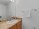 Clean bathroom featuring a vanity with a sink and a towel rack against a white wall at 2584 Grayton Loop, Villa Rica, GA 30180
