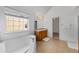 Bright bathroom featuring a soaking tub, double vanity, and walk-in closet at 2584 Grayton Loop, Villa Rica, GA 30180