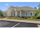 Community clubhouse with manicured landscaping and ample parking, an ideal gathering spot at 2584 Grayton Loop, Villa Rica, GA 30180