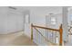Bright hallway featuring neutral walls, carpet floors, and modern lighting at 2584 Grayton Loop, Villa Rica, GA 30180
