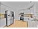 Modern kitchen featuring stainless steel appliances and granite countertops at 2584 Grayton Loop, Villa Rica, GA 30180