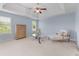 Spacious primary bedroom with a trey ceiling and ample natural light at 2584 Grayton Loop, Villa Rica, GA 30180