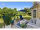Comfortable outdoor seating area with plush cushions, a modern fire pit, and view of the backyard at 2584 Grayton Loop, Villa Rica, GA 30180