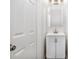 Well-lit bathroom with a modern vanity, ample storage, and contemporary fixtures at 2681 Lakeside Sw Dr, Conyers, GA 30094