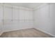 Spacious walk-in closet with ample shelving and storage space at 2681 Lakeside Sw Dr, Conyers, GA 30094