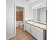 Bathroom with vanity with solid surface top and neutral tiled shower and flooring at 3924 Chimney Ridge Ct, Ellenwood, GA 30294