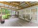 Large covered deck with seating area perfect for relaxing or entertaining guests at 9048 River Bend Ct, Villa Rica, GA 30180