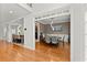 Open concept dining room with hardwood floors and natural light, convenient to the Kitchen at 9048 River Bend Ct, Villa Rica, GA 30180