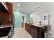 Spacious kitchen boasts a large island with seating, stainless steel appliances, and modern fixtures at 9048 River Bend Ct, Villa Rica, GA 30180