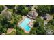 Aerial view of the community pool, playground, and surrounding homes at 162 Daltree Ct, Marietta, GA 30068