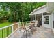 Outdoor patio with slate flooring, seating and barbecue grill, ideal for relaxing and enjoying the backyard at 162 Daltree Ct, Marietta, GA 30068