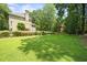 Sprawling back yard with ample space for outdoor activities and entertaining with mature trees at 162 Daltree Ct, Marietta, GA 30068