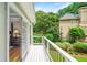 Private balcony off the main bedroom offers views of the lush backyard and surrounding greenery at 162 Daltree Ct, Marietta, GA 30068