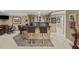 Basement bar area with seating, cabinets, and open access to the common area at 162 Daltree Ct, Marietta, GA 30068