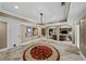 Basement foyer with tiled flooring, arched doorway and views into other rooms at 162 Daltree Ct, Marietta, GA 30068
