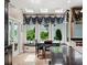 Charming breakfast nook with a bay window, comfortable seating, and natural light, perfect for dining at 162 Daltree Ct, Marietta, GA 30068