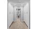 Walk-in closet showing hall to bonus room, offering ample storage and access to the en-suite bathroom at 162 Daltree Ct, Marietta, GA 30068