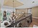 A grand foyer with a view of the living room showcasing fireplace, large windows, and a decorative chandelier at 162 Daltree Ct, Marietta, GA 30068