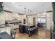 Spacious kitchen features custom cabinets, stainless steel appliances, and a large center island with seating at 162 Daltree Ct, Marietta, GA 30068
