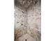 Close up of the marble tiled corner shower with multiple shower heads and glass enclosure at 162 Daltree Ct, Marietta, GA 30068