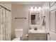 Neutral bathroom featuring a shower/tub, toilet, vanity and sink and plenty of storage at 2020 Commonwealth Pl, Cumming, GA 30041