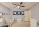 A cute Bedroom featuring a crib, themed wall decorations, and a dresser at 2020 Commonwealth Pl, Cumming, GA 30041
