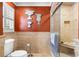 Bathroom featuring glass enclosed shower with a bench seat at 2595 Winthrope Way, Lawrenceville, GA 30044