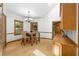 Bright breakfast nook with hardwood floors, and views from two windows, adjacent to the kitchen at 2595 Winthrope Way, Lawrenceville, GA 30044