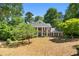 Two story traditional style home featuring mature trees, and a well manicured lawn at 2595 Winthrope Way, Lawrenceville, GA 30044