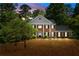 Stately home featuring mature trees providing ample shade and a picturesque setting at 2595 Winthrope Way, Lawrenceville, GA 30044